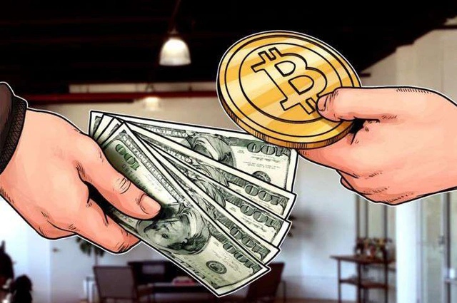 Giao dịch đầu tiên dùng Bitcoin để mua hàng hóa ngoài đời thực là mặt hàng nào?