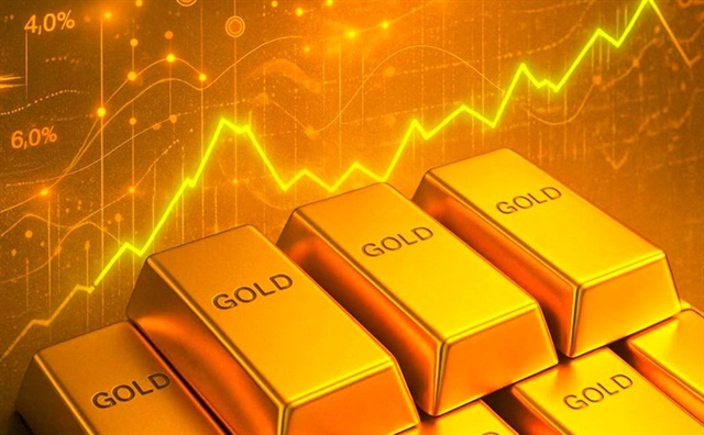 Vàng thế giới dao động gần mốc 5,000 USD 